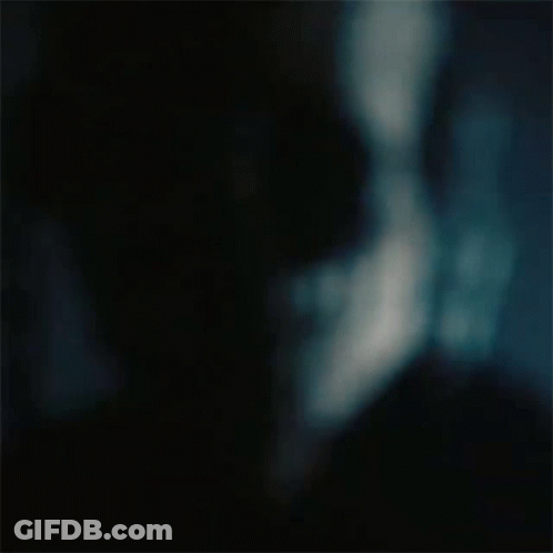 A Blurry Picture Of A Man 'S Face With Sunglasses On . GIF