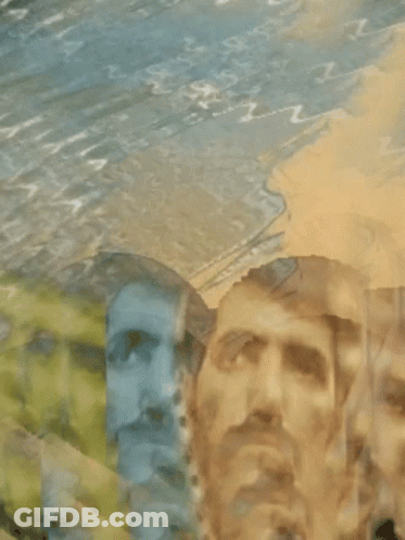 A Blurry Picture Of A Man 'S Face With The Letter Z On The Bottom GIF