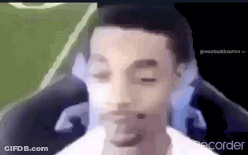 A Blurry Picture Of A Man 'S Face With The Word Recorder In The Corner . GIF