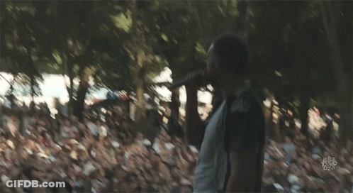 A Blurry Picture Of A Man Walking In The Woods With A Watermark That Says ' Let 'S Do It ' GIF