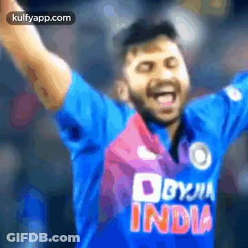 A Blurry Picture Of A Man Wearing A Shirt That Says Byju's India GIF