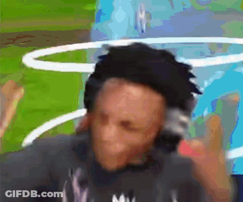 A Blurry Picture Of A Man Wearing Headphones And A Shirt That Says ' Mv ' On It GIF