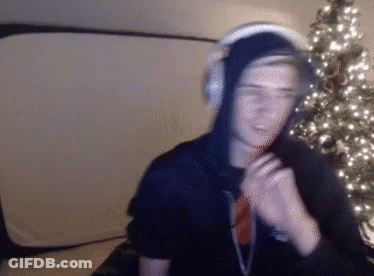 A Blurry Picture Of A Man Wearing Headphones GIF