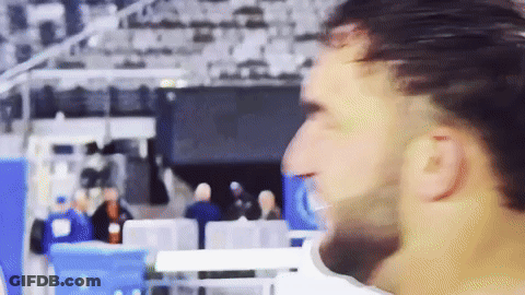 A Blurry Picture Of A Man With A Beard GIF
