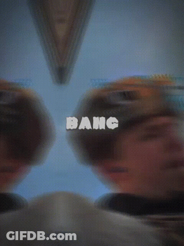 A Blurry Picture Of A Man With The Word Bang Written On It GIF