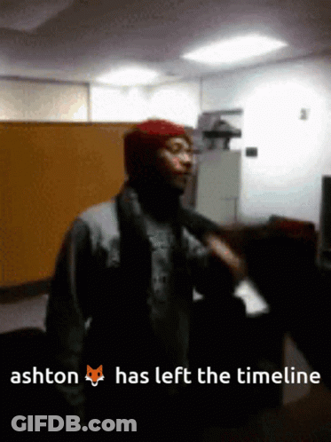 A Blurry Picture Of A Man With The Words Ashton Has Left The Timeline GIF