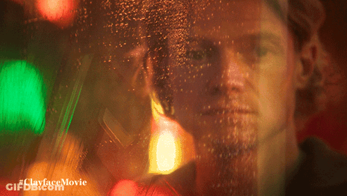 A Blurry Picture Of A Man With The Words #Clayfacemovie Below GIF