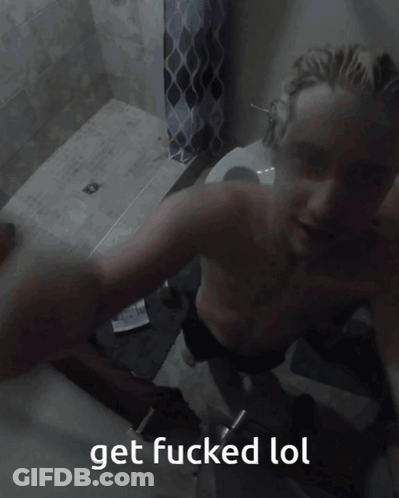 A Blurry Picture Of A Man With The Words Get Fucked Lol Written Below Him GIF
