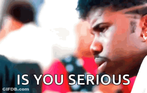 A Blurry Picture Of A Man With The Words " Is You Serious " On The Bottom GIF