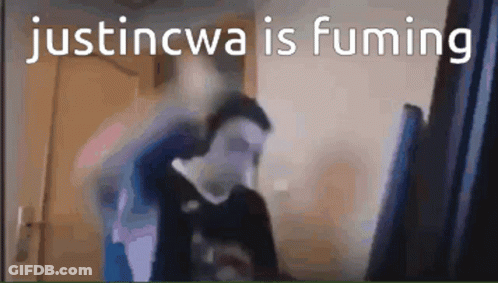 A Blurry Picture Of A Man With The Words Justincwa Is Fuming Written On The Bottom GIF