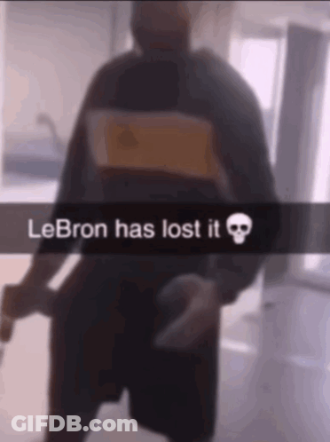 A Blurry Picture Of A Man With The Words Lebron Has Lost It On It GIF