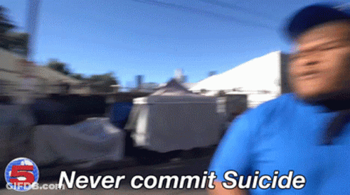 A Blurry Picture Of A Man With The Words " Never Commit Suicide " On The Bottom GIF