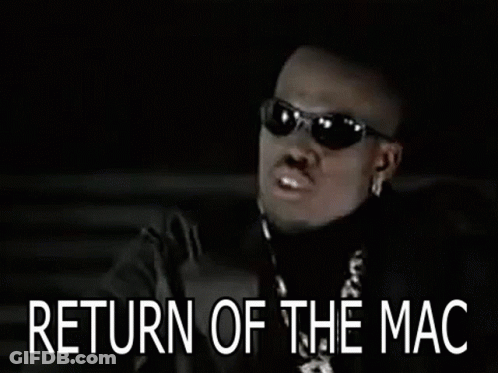 A Blurry Picture Of A Man With The Words Return Of The Mac Written Below Him GIF
