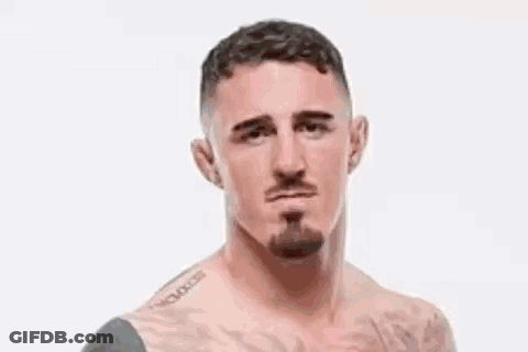 A Blurry Picture Of A Man With The Words " Stop Ducking And Fight Gane " Above Him GIF