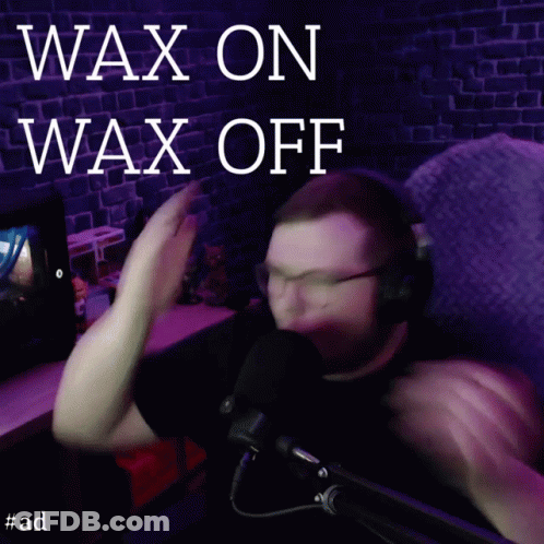 A Blurry Picture Of A Man With The Words Wax On Wax Off Above Him GIF