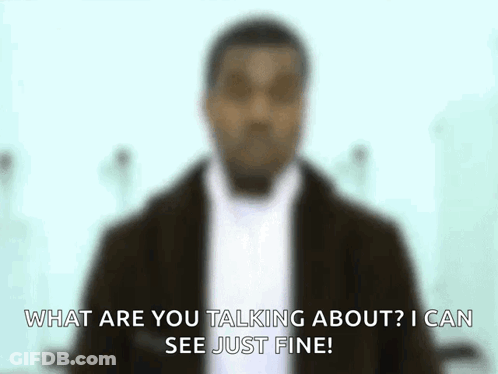 A Blurry Picture Of A Man With The Words What Are You Talking About I Can See Just Fine . GIF