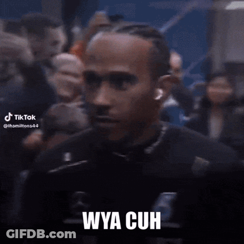 A Blurry Picture Of A Man With The Words " Wya Cuh " On The Bottom GIF