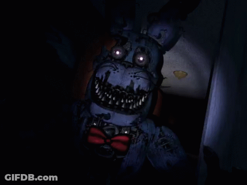 A Blurry Picture Of A Monster With Purple Eyes GIF