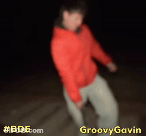 A Blurry Picture Of A Person Dancing With The Words Groovy Gavin Above GIF