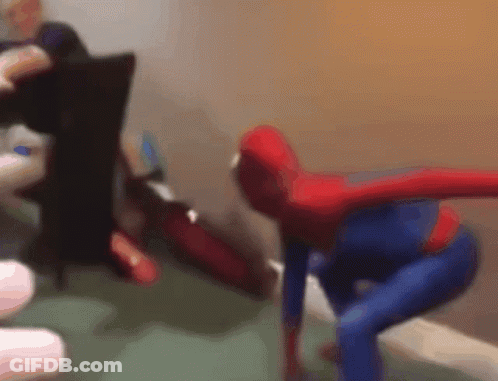 A Blurry Picture Of A Person Dressed As Spider Man GIF