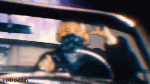 A Blurry Picture Of A Person In A Car GIF