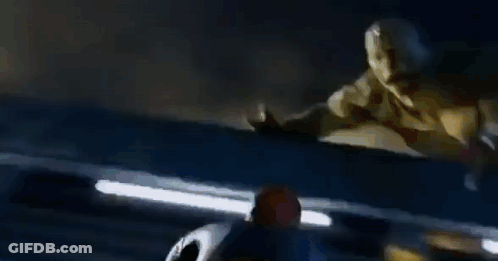 A Blurry Picture Of A Person In A Superhero Suit GIF