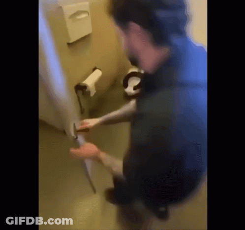 A Blurry Picture Of A Person Opening A Door GIF