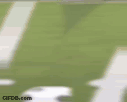 A Blurry Picture Of A Person Playing A Game Of Soccer GIF