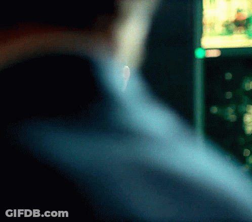 Blurry Person Back With Green Light Behind GIF