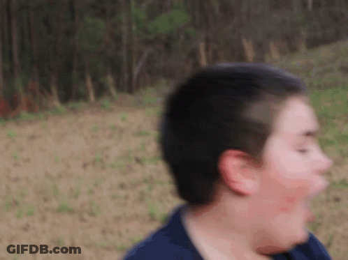 A Blurry Picture Of A Person 'S Face And Head GIF