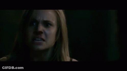 A Blurry Picture Of A Person 'S Face With A Black Background . GIF