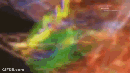 Blurry Face With Green And Yellow Background GIF