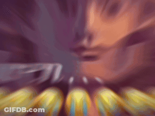 A Blurry Picture Of A Person 'S Face With A Purple Background GIF