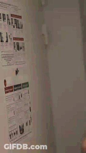 A Blurry Picture Of A Person 'S Face With A White Shirt On GIF