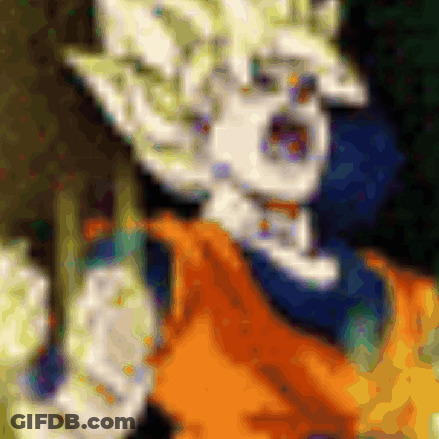 A Blurry Picture Of A Person 'S Face With A Yellow Shirt On GIF