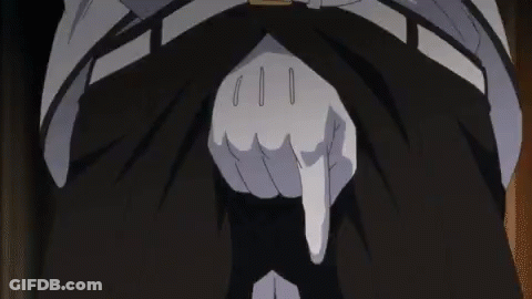 A Blurry Picture Of A Person 'S Torso And Legs In A Dark Room . GIF