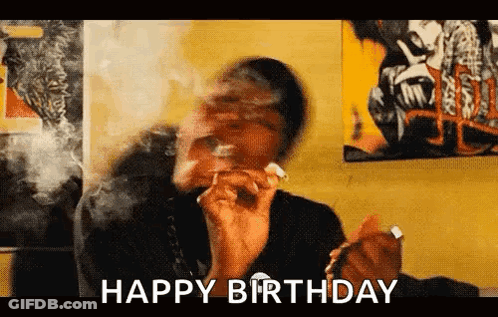 A Blurry Picture Of A Person Smoking A Cigarette With The Words `` Happy Birthday '' Written In The Corner . GIF