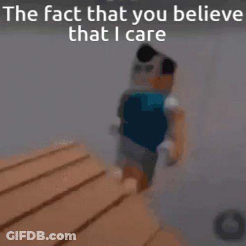A Blurry Picture Of A Person Standing Next To A Wooden Table With The Words `` The Fact That You Believe That I Care '' GIF