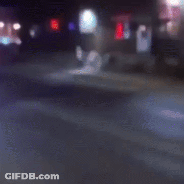 Blurry Person Walking Down Street GIF