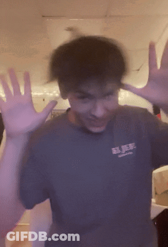 A Blurry Picture Of A Person Wearing A Shirt That Says Rvr On It GIF