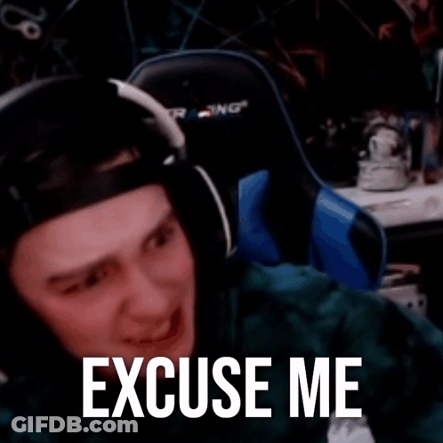A Blurry Picture Of A Person With Headphones And The Words `` Excuse Me '' Written On It . GIF