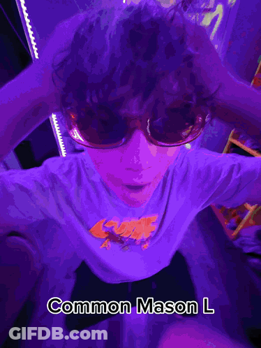A Blurry Picture Of A Person With The Name Common Mason L On It GIF