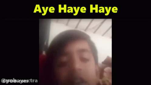 A Blurry Picture Of A Person With The Words Aye Haye Haye Above Them GIF