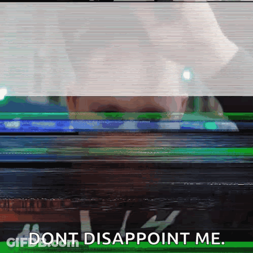 A Blurry Picture Of A Person With The Words " Dont Disappoint Me " On The Bottom Right GIF