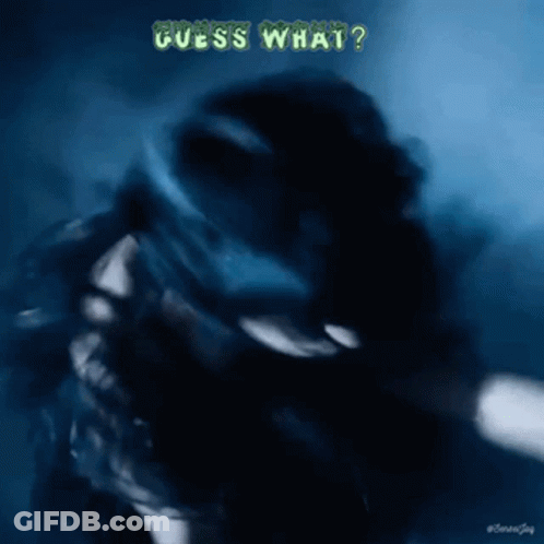 A Blurry Picture Of A Person With The Words Guess What Written On It GIF