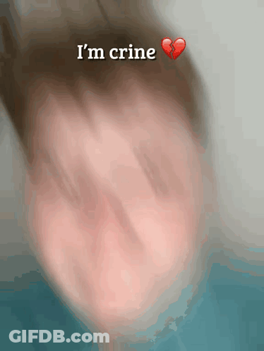 A Blurry Picture Of A Person With The Words I 'M Crine Written On It GIF