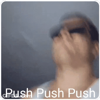 A Blurry Picture Of A Person With The Words Push Push Push Written Below Them GIF