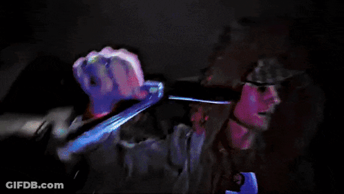 A Blurry Picture Of A Person With Their Hands Painted Red GIF