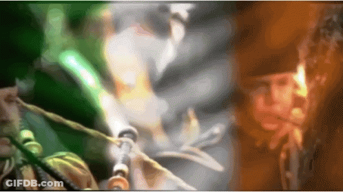 A Blurry Picture Of A Plant With A Green And Brown Background GIF