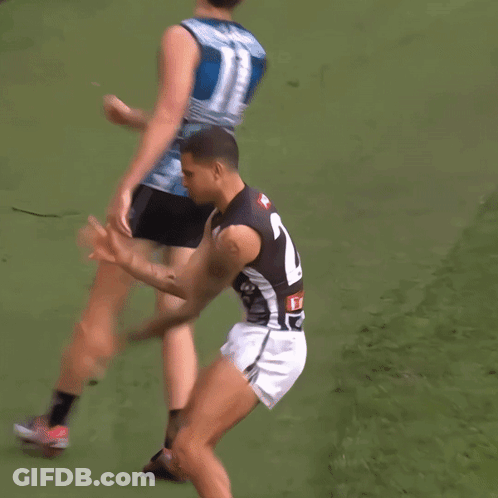 A Blurry Picture Of A Player Wearing A Number 23 Jersey GIF